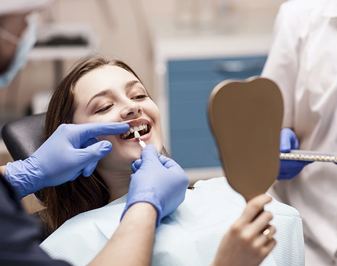 What are the disadvantages of dental veneers?